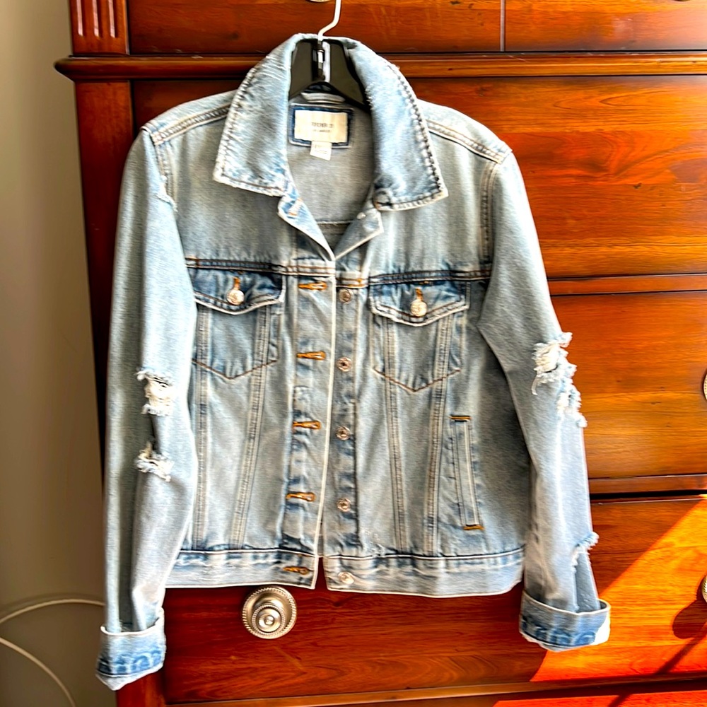 Distressed denim jacket
